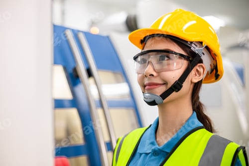 Preview: Asian female worker working in factory