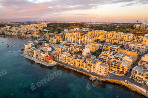 Preview: Marsaskala townscape at sunrise, Malta. Aerial drone view