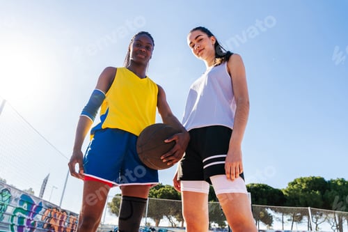 Preview: Female basketball players training at city basketball court