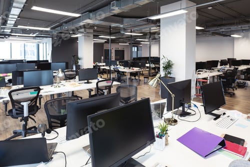 Preview: Interior of empty modern office with desks and computers