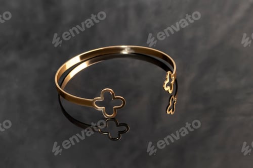 Preview: Bracelets. Women's jewelry on a dark background. Metal products. Fashion.
