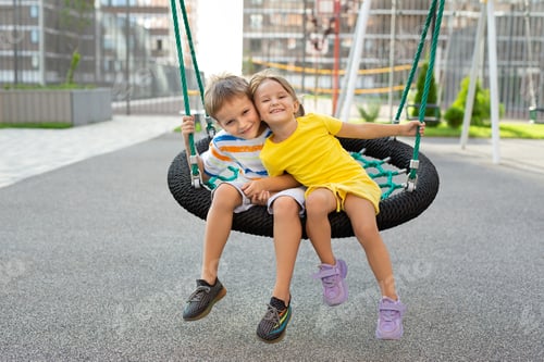 Preview: A boy and a girl ride on a swing, a spider web, a nest and have fun.