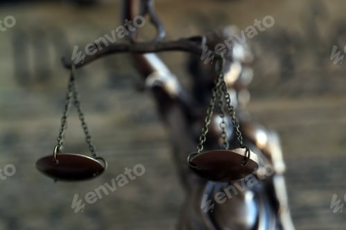 Preview: Dark scene with Lady Justice and background of US Constitution page. Lawsuit and judgement in US