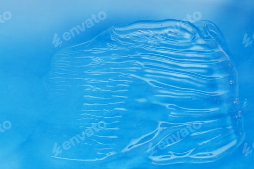 Preview: texture of white cream on a blue background
