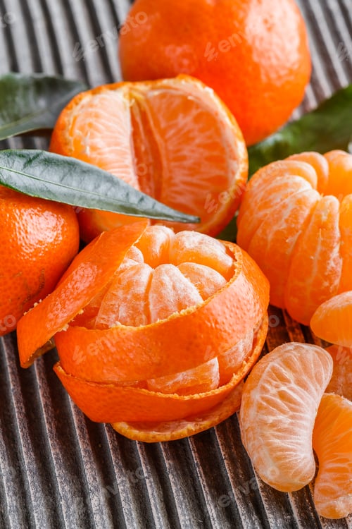 Preview: juicy mandarin on a gray wooden rustic background