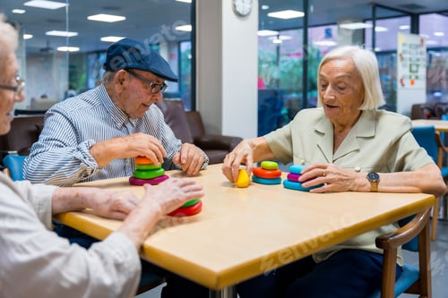 Preview: Aged people in a nursing home sharing skills games