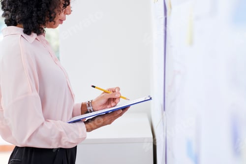 Preview: Businesswoman checking document