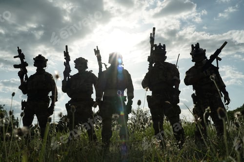 Preview: Soldier in full US MARSOC armed with assault rifle run through the abandoned building. Military