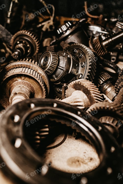 Preview: Vertical closeup shot of industrial gear mechanisms