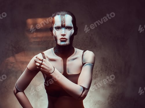 Preview: Sensual cyber woman. Technology and future concept. Isolated on a dark textured background.