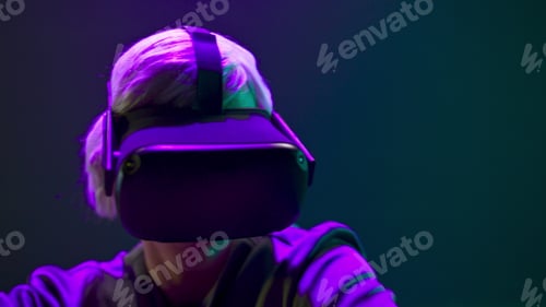 Preview: VR glasses person dancing metaverse closeup. Millennial man relaxing 3d headset