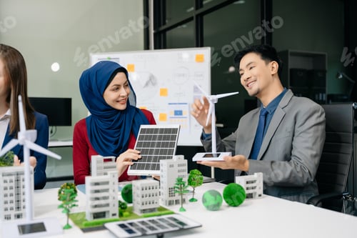 Preview: Business people having consultation about wind energy at company office. Business team discussing