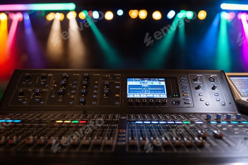 Preview: Live theater concert show sound video music control console with scene lights background. Sound