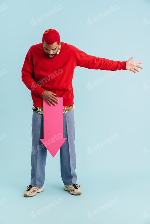 Preview: Surprised african american guy pointing paper arrow downward