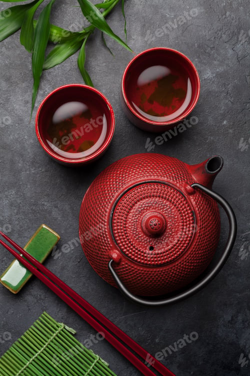 Preview: Green tea in bowls and teapot