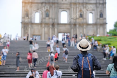 Preview: Asian hipster traveler looking to Ruins of St. Paul's, Historic Centre of Macau