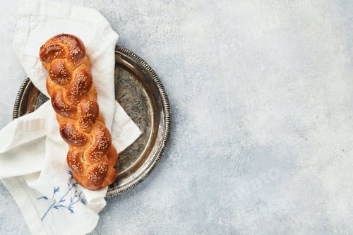 Preview: Sabbath kiddush ceremony composition. Challah bread. Freshly baked homemade braided challah bread fo