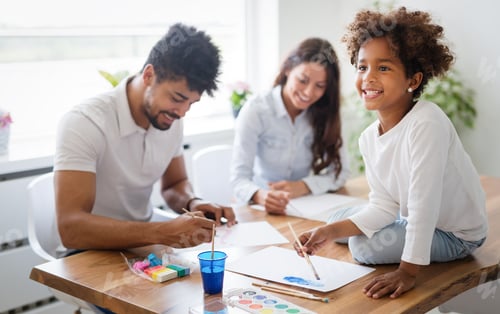 Preview: Mom and dad drawing with their daughter