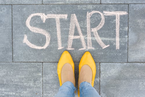 Preview: Word start on the asphalt and feet woman