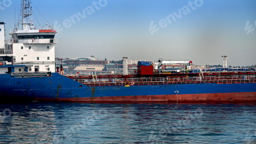 Preview: Long cargo ship or gas tanker on sunny day