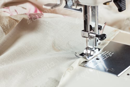 Preview: Modern sewing machine and item of clothing