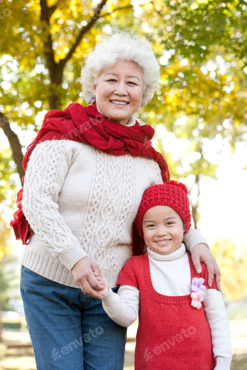 Preview: Grandmother and Granddaughter Enjoying a Park in Autumn