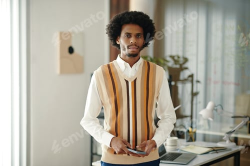 Preview: Portrait of Developer with Smartphone