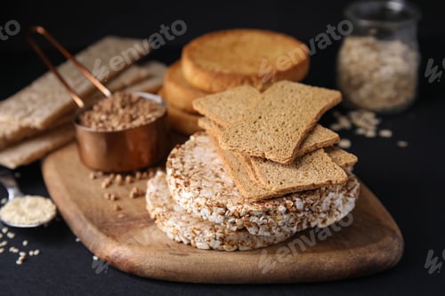 Preview: Rye crispbreads, rice cakes and rusks on black table