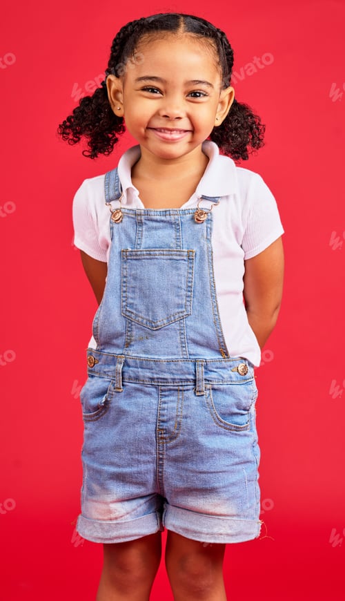 Preview: Child, little and portrait of girl in studio, happy and smile on red background with mockup. Face,