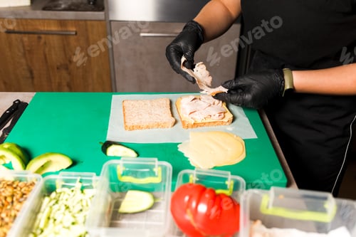 Preview: Process of making toast with ham and cheese in a restaurant kitchen