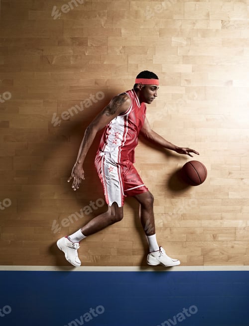 Preview: Basketball player laying on court