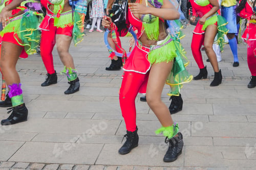 Preview: The caribbean women dancing in costumes in downtown
