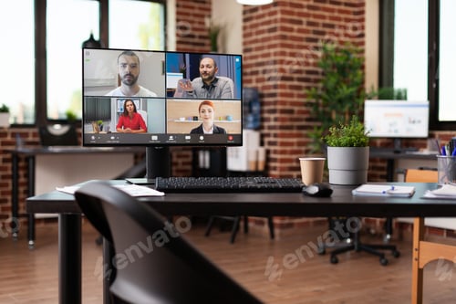 Preview: Online video call meeting with workmates on computer