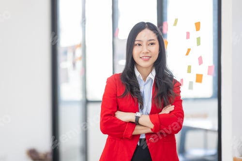 Preview: Young Serious Asian Creative team use post it notes to share idea sticky note on glass wall. Asian