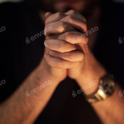 Preview: Praying for forgiveness. Closeup shot of a man with his hands clasped in prayer.