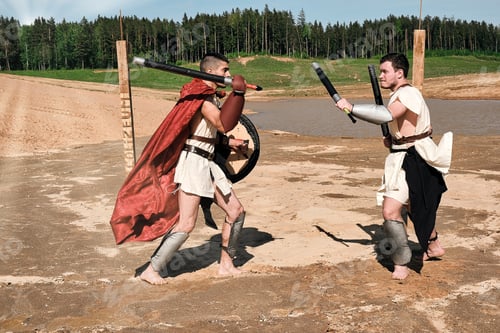 Preview: A Concept Photo Of A Roman Battle Of Two Warriors Of The Colosseum In Action With Aggressive