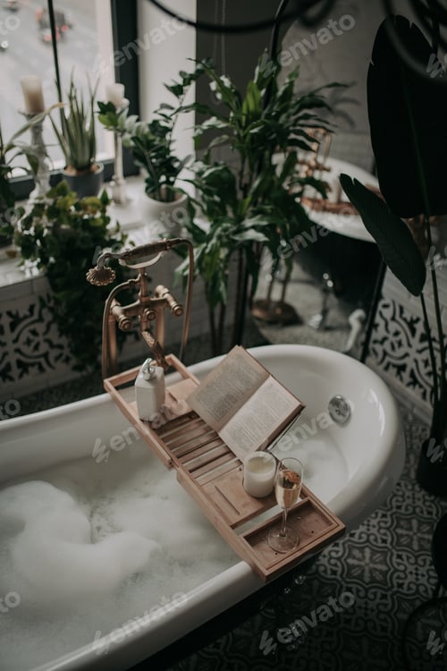 Preview: Luxurious interior bathroom in modern eco style with oval bathtub and book on bamboo wood tray