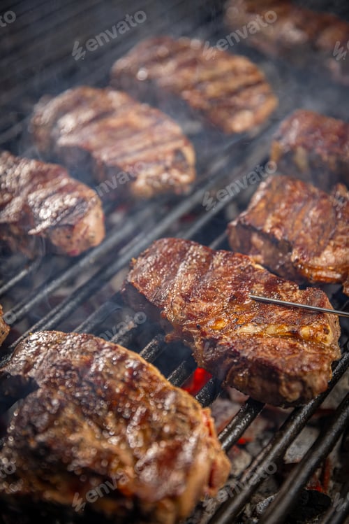 Preview: Steaks are in various stages of cooking