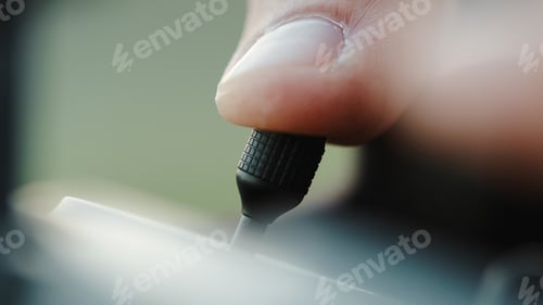 Preview: Finger on joystick of remote controller