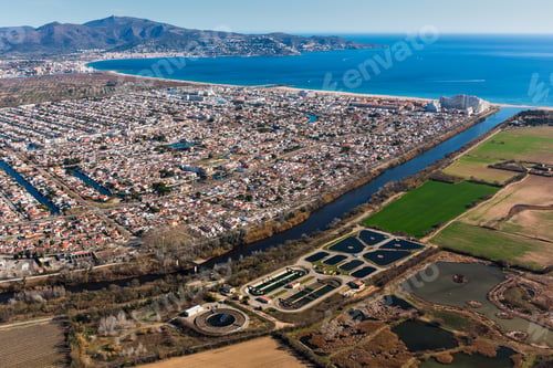 Preview: Aerial shot of fields and coastal city