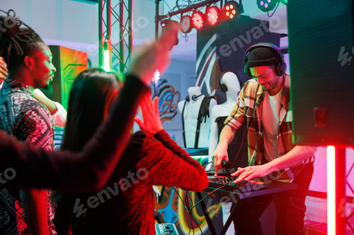 Preview: Dj playing electronic music in club