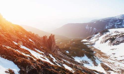 Preview: Colorful spring sunset over the mountain ranges in the national
