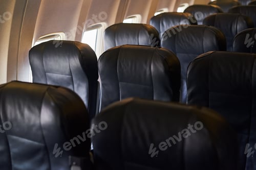 Preview: Empty airplane passenger seats in airplane. A plane interior