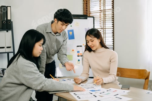 Preview: Asian businessman and woman people meeting in home office. Employee brainstorm and work as team