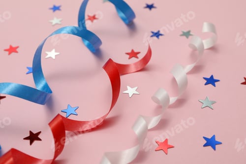 Preview: White, red and blue curly ribbons and stars on pink background