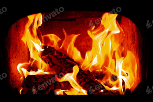 Preview: Flame of Wooden logs being burn inside stove