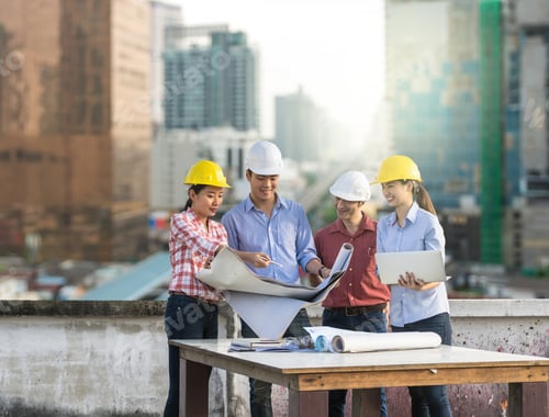 Preview: Happy professional construction engineers working with Corporate Colleagues Teamwork