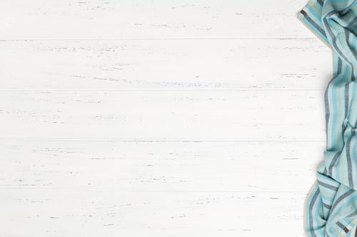 Preview: White Wooden Surface with Blue Striped Textile