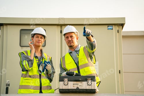 Preview: photovoltaic panel, Engineer with energy measurement tool photovoltaic modules for energy