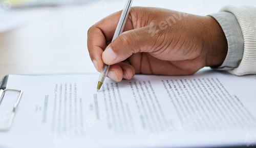Preview: Closeup shot of an unrecognisable man going through paperwork